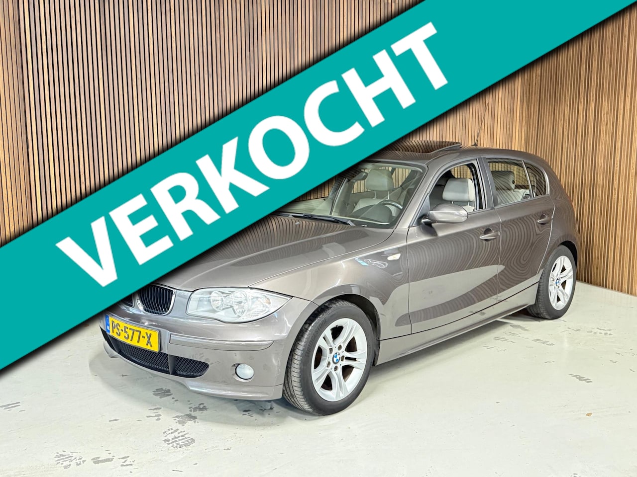 BMW 1-serie - 118i Business Line - Aut- leer - AutoWereld.nl