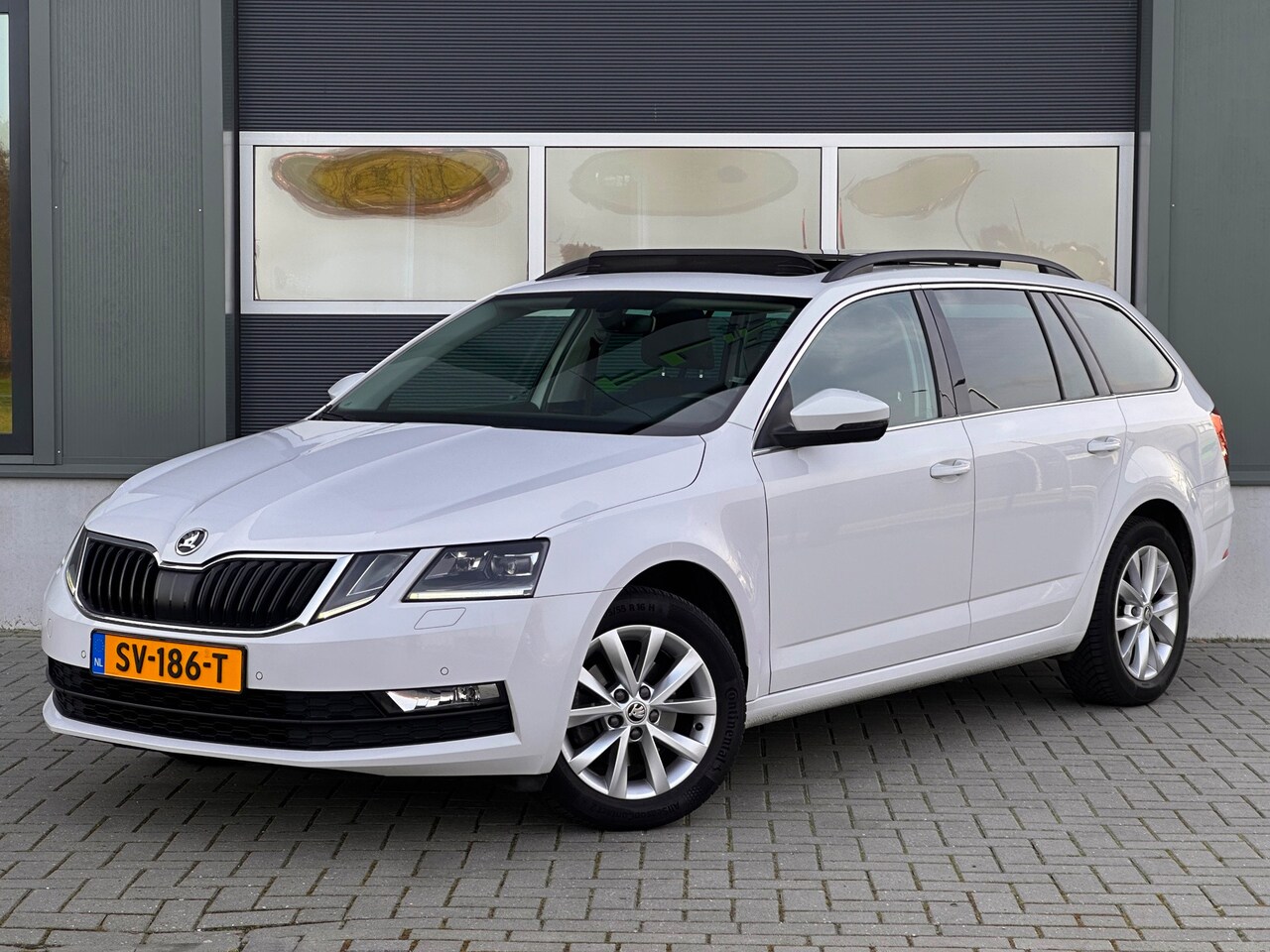 Skoda Octavia Combi - 1.5 TSI Business DSG Pano CarPlay BTW - AutoWereld.nl