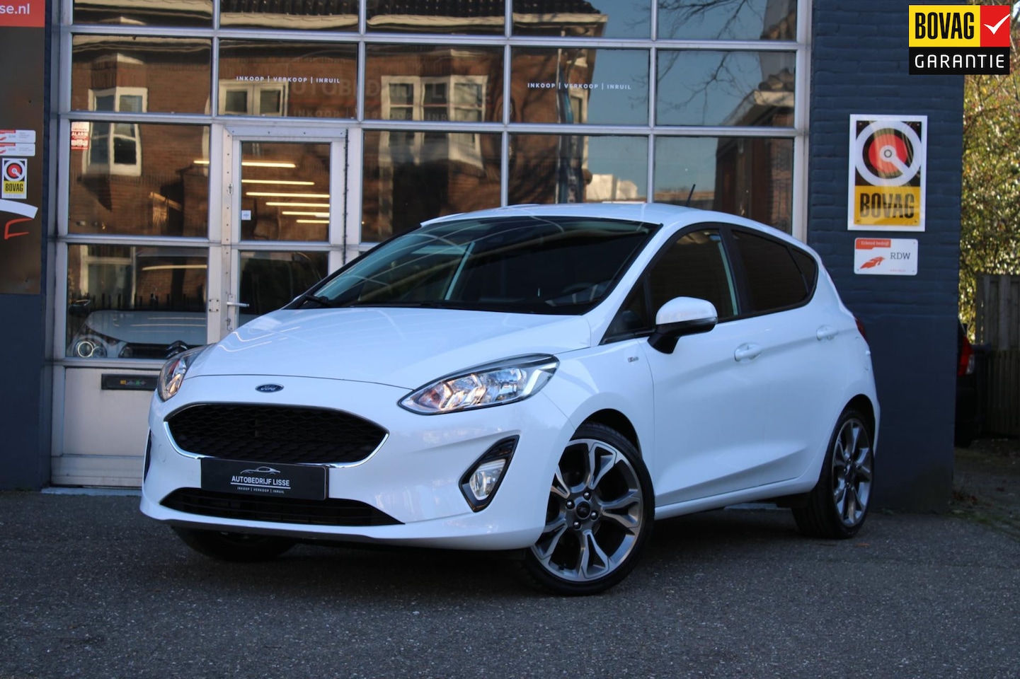 Ford Fiesta - 1.1 Airco Navi Carplay PDC Nap - AutoWereld.nl