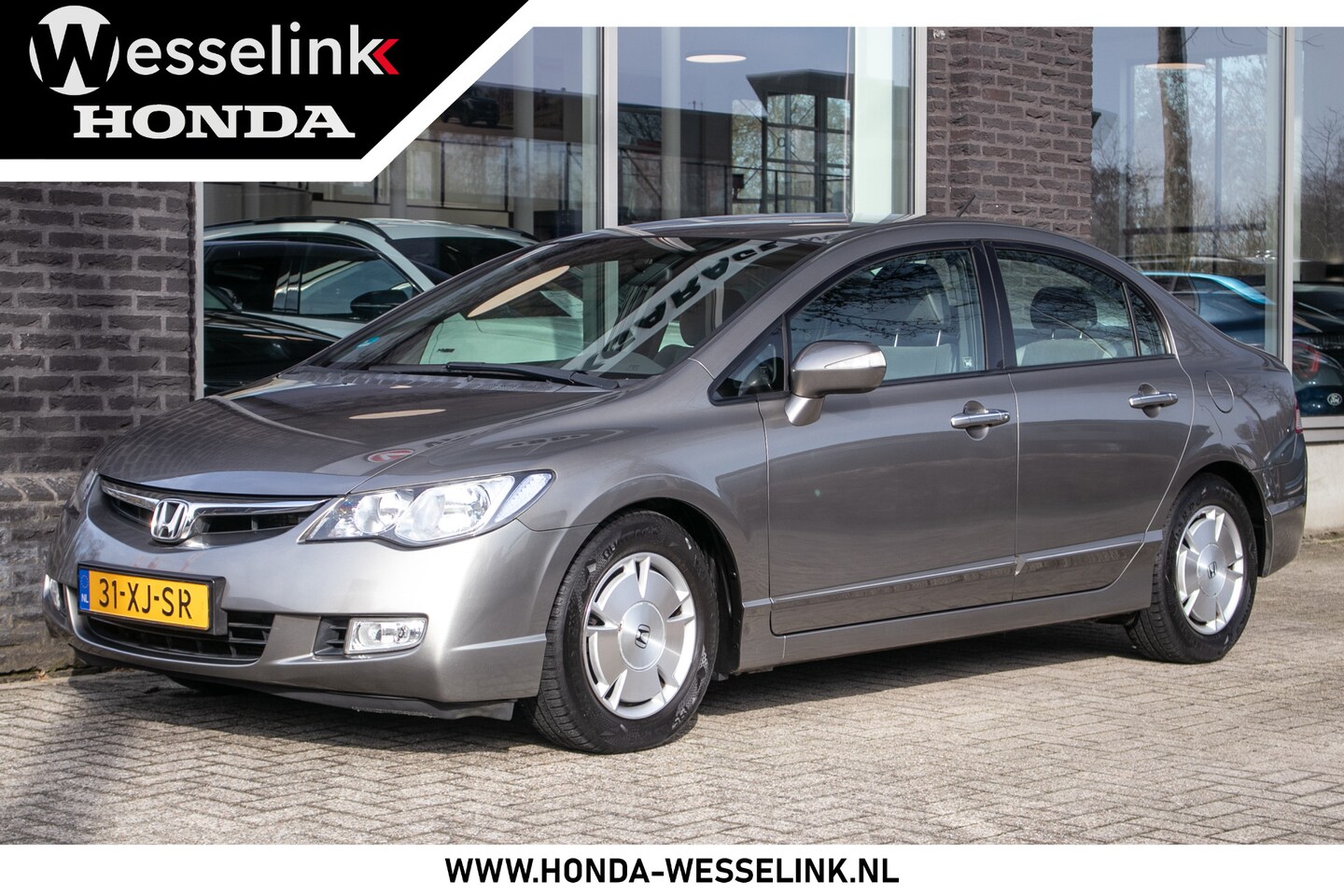 Honda Civic - 1.3 Hybrid | dealer onderhouden | 1e eigenaar | all season banden | - AutoWereld.nl
