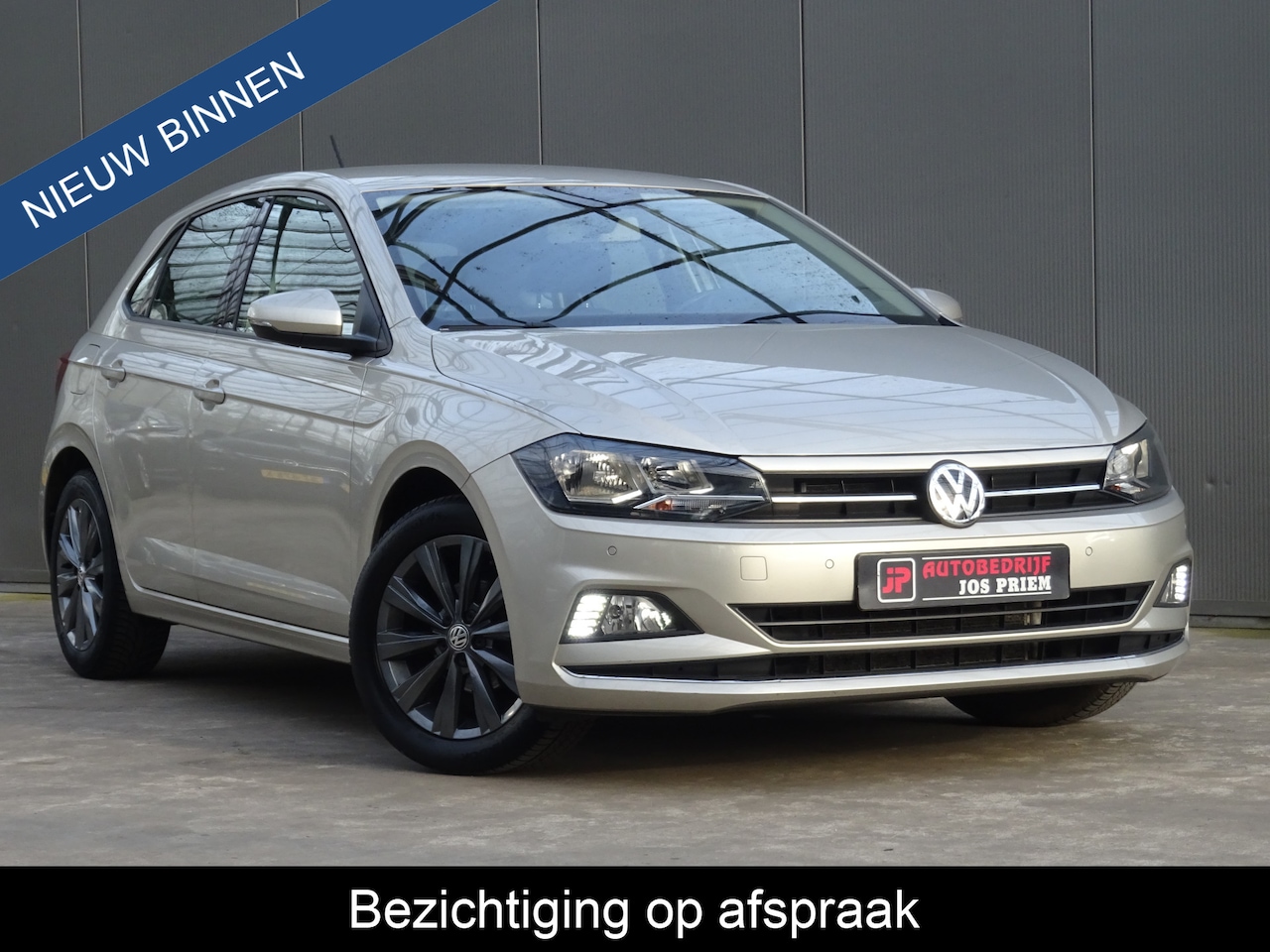 Volkswagen Polo - 1.0 TSI Highline * PDC * 4 SEIZOENSBANDEN * CAMERA !! - AutoWereld.nl