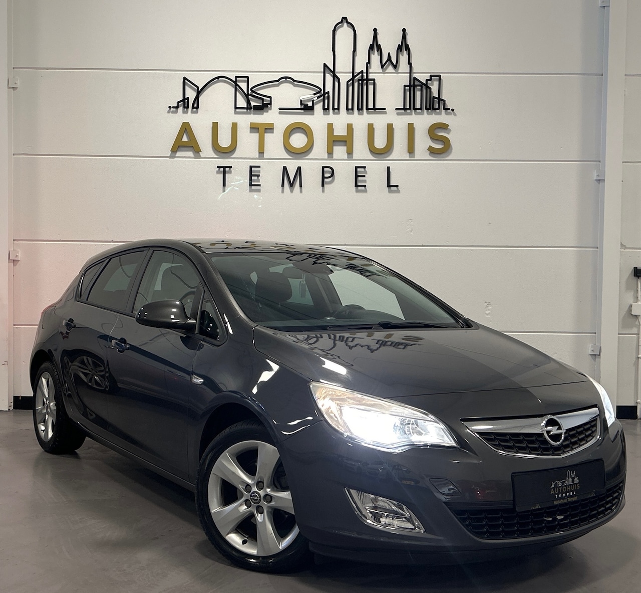 Opel Astra - 1.4 Turbo Edition Nap Airco Cruise 6bak Parkeersensoren Isofix 17Inch - AutoWereld.nl
