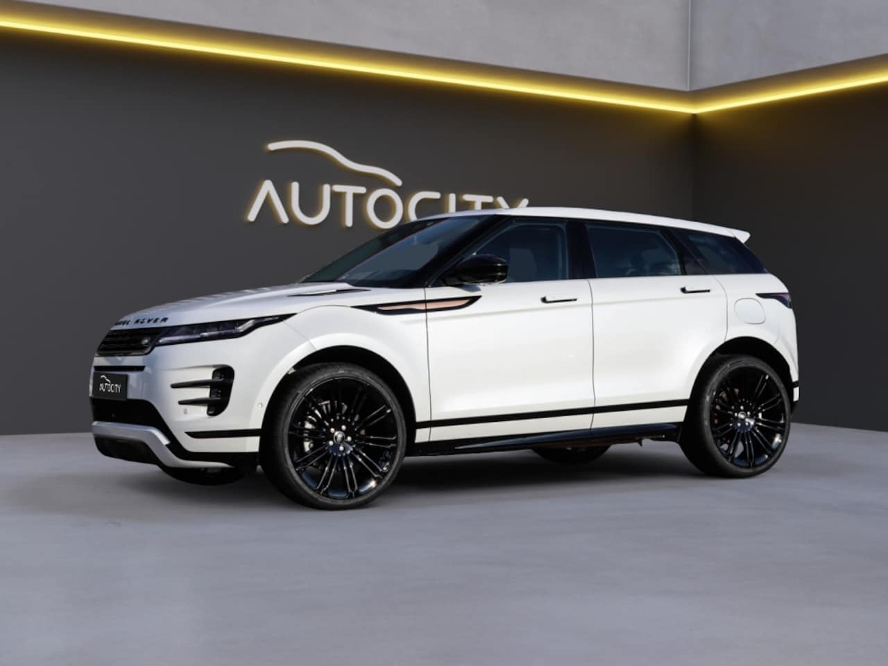 Land Rover Range Rover Evoque - 1.5 P300e AWD Dynamic SE HUD l 360 Camera l Pano l VOL OPTIES - AutoWereld.nl