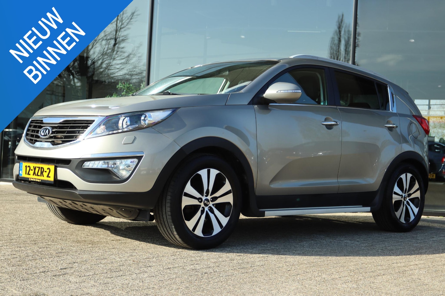 Kia Sportage - 2.0 X-CLUSIVE AUT. | TREKHAAK | XENON | LEDER | CAMERA | NAVI | KEY-LESS | TREEPLANKEN - AutoWereld.nl