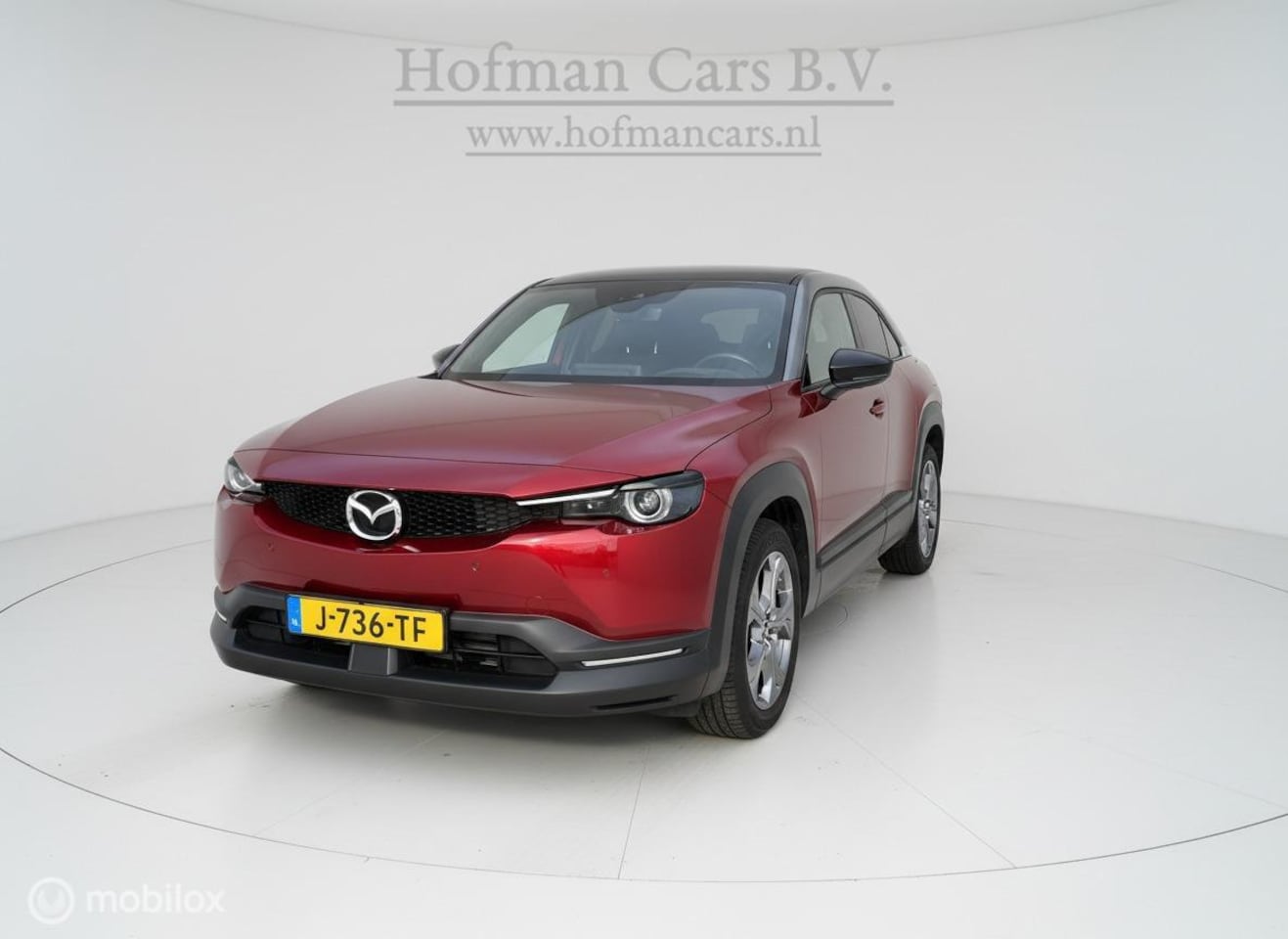Mazda MX-30 - e-SkyActiv 145 First Edition 36 kWh | SOH 95% | HUD | CCS Snelladen | Uniek Mazda Rood - AutoWereld.nl