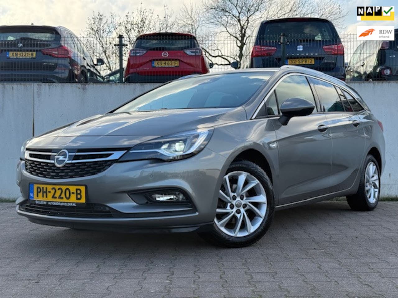 Opel Astra Sports Tourer - 1.4 Innovation/NAVI/CAMERA/CARPLAY/PDC/FULL LED/STUUR EN STOEL VERWARMING/ - AutoWereld.nl