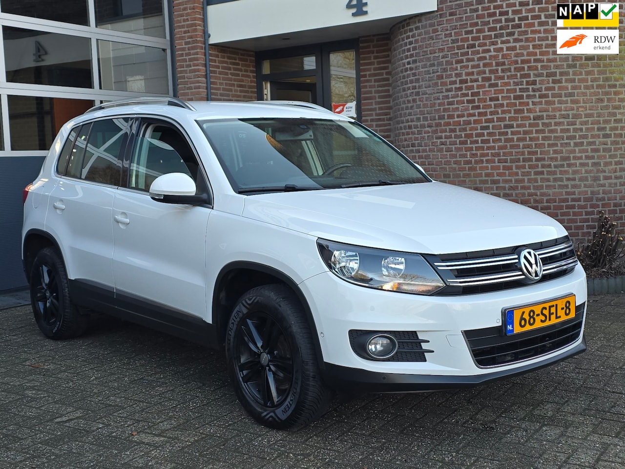 Volkswagen Tiguan - 1.4 TSI Sport&Style Nap |Apk |PDC |Trekhaak - AutoWereld.nl