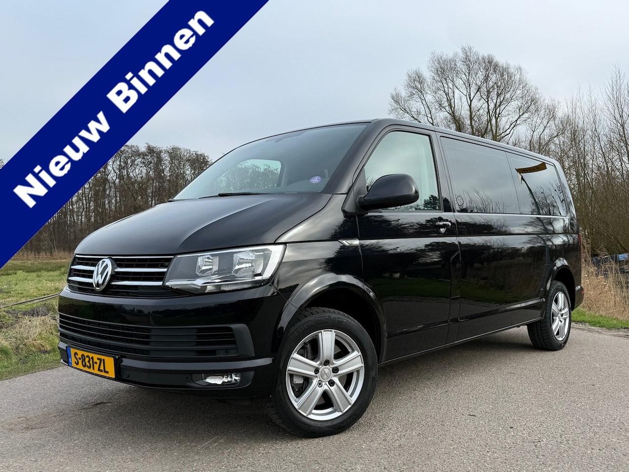 Volkswagen Transporter Kombi - 2.0 TSI L2 Automaat | 9 Persoons | BTW-auto | Camera | Navi | Stoelverwarming | 17" Velgen - AutoWereld.nl