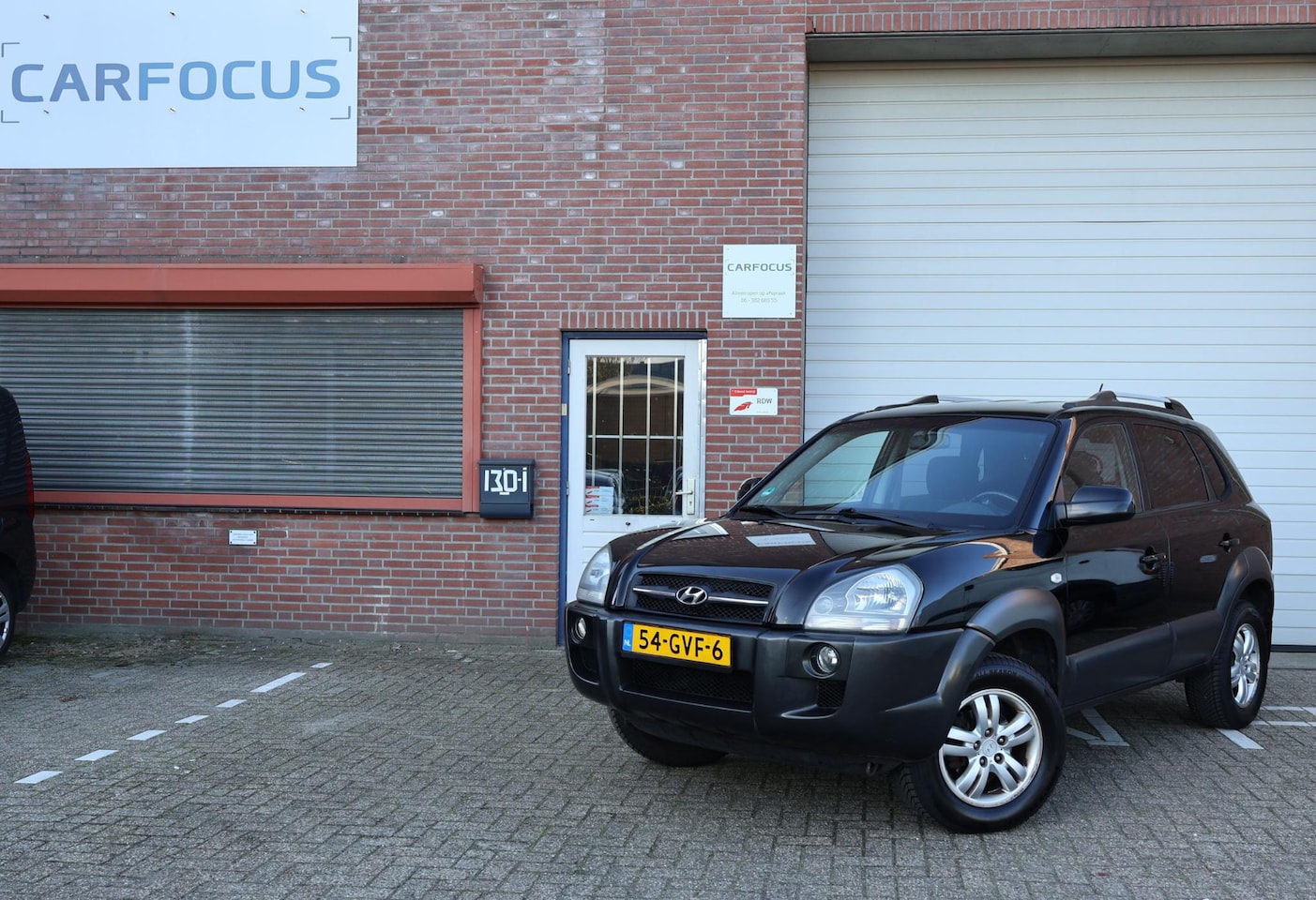 Hyundai Tucson - 2.0i Style NAP 2e eigenaar Trekhaak Cruise Airco APK - AutoWereld.nl