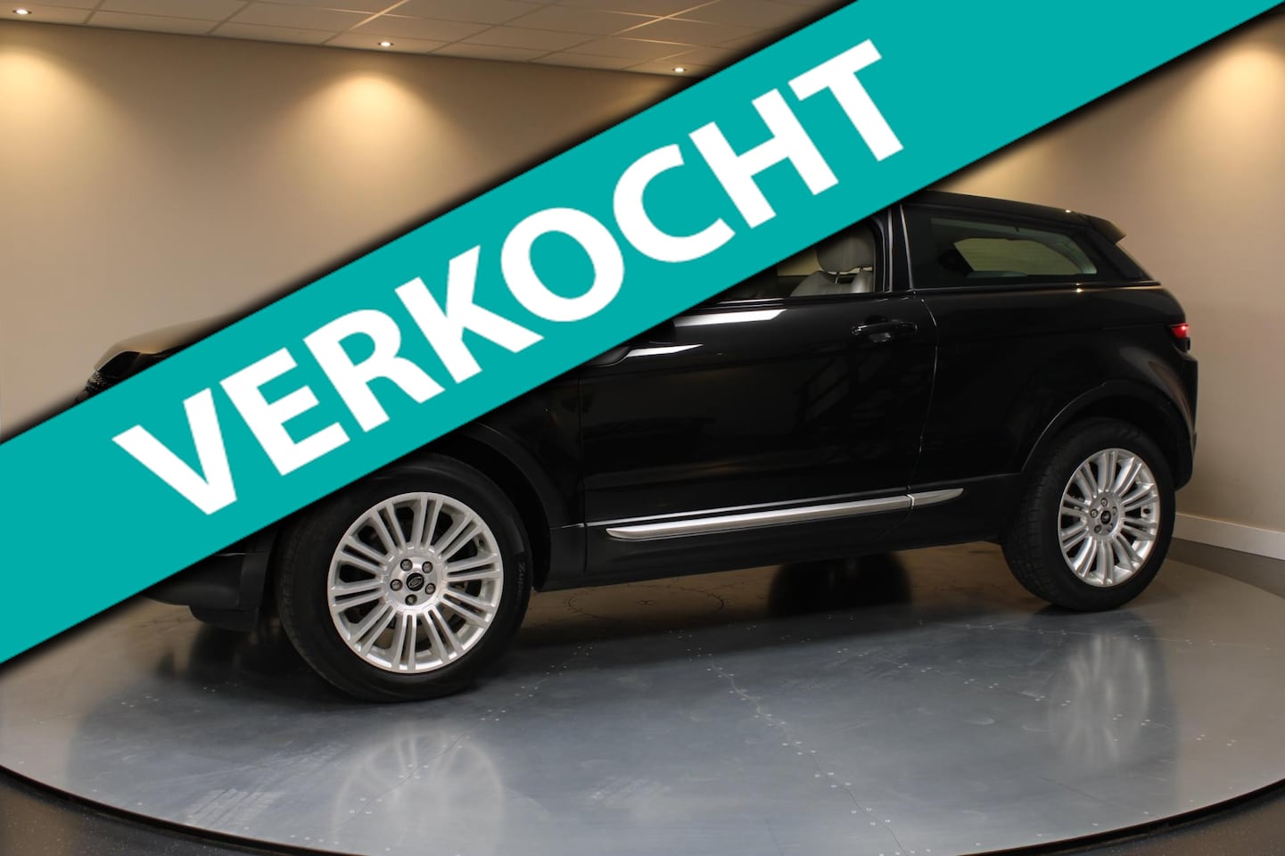 Land Rover Range Rover Evoque Coupé - 2.0 Si 4WD Prestige *Pano* Memory|Meridian|Camera|Navi - AutoWereld.nl