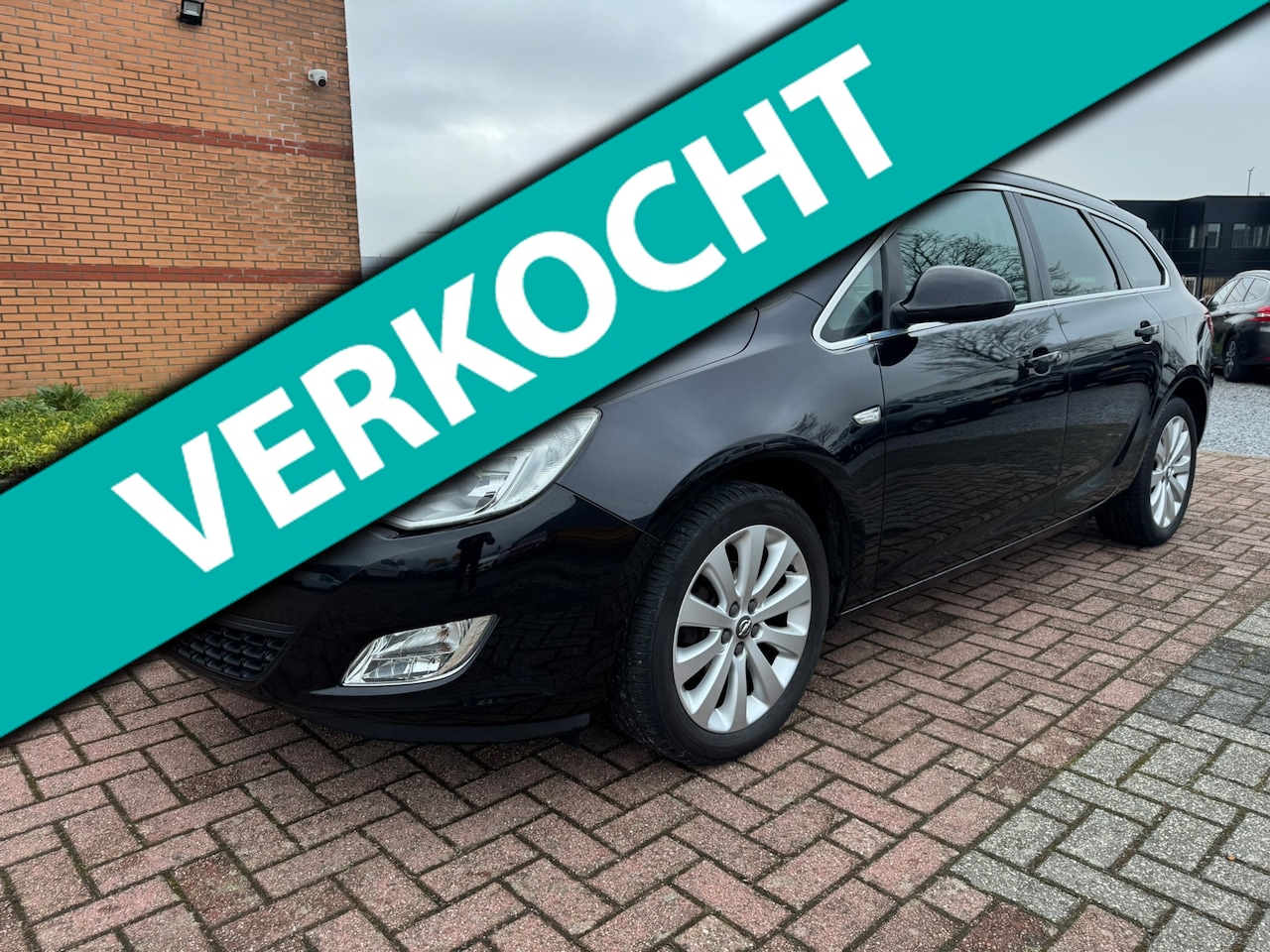 Opel Astra Sports Tourer - 1.4 Turbo Cosmo 1.4 Turbo Cosmo, Automaat, Half Leder, PDC, Navi, Climatronic, - AutoWereld.nl