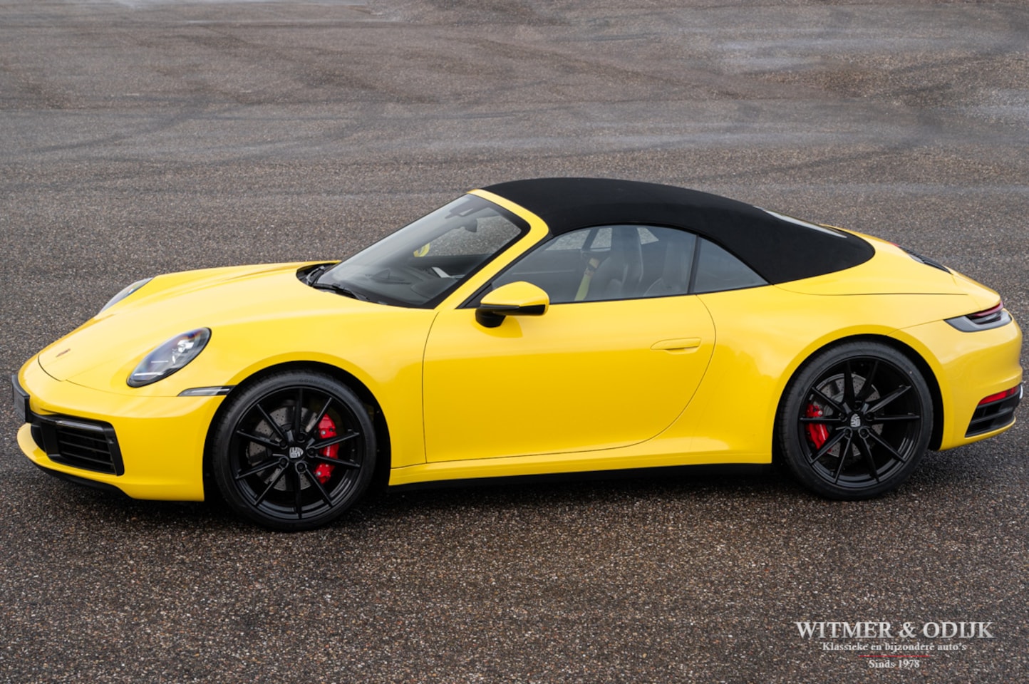 Porsche 911 Cabrio - 3.0 Carrera 4 S Racing Yellow - AutoWereld.nl