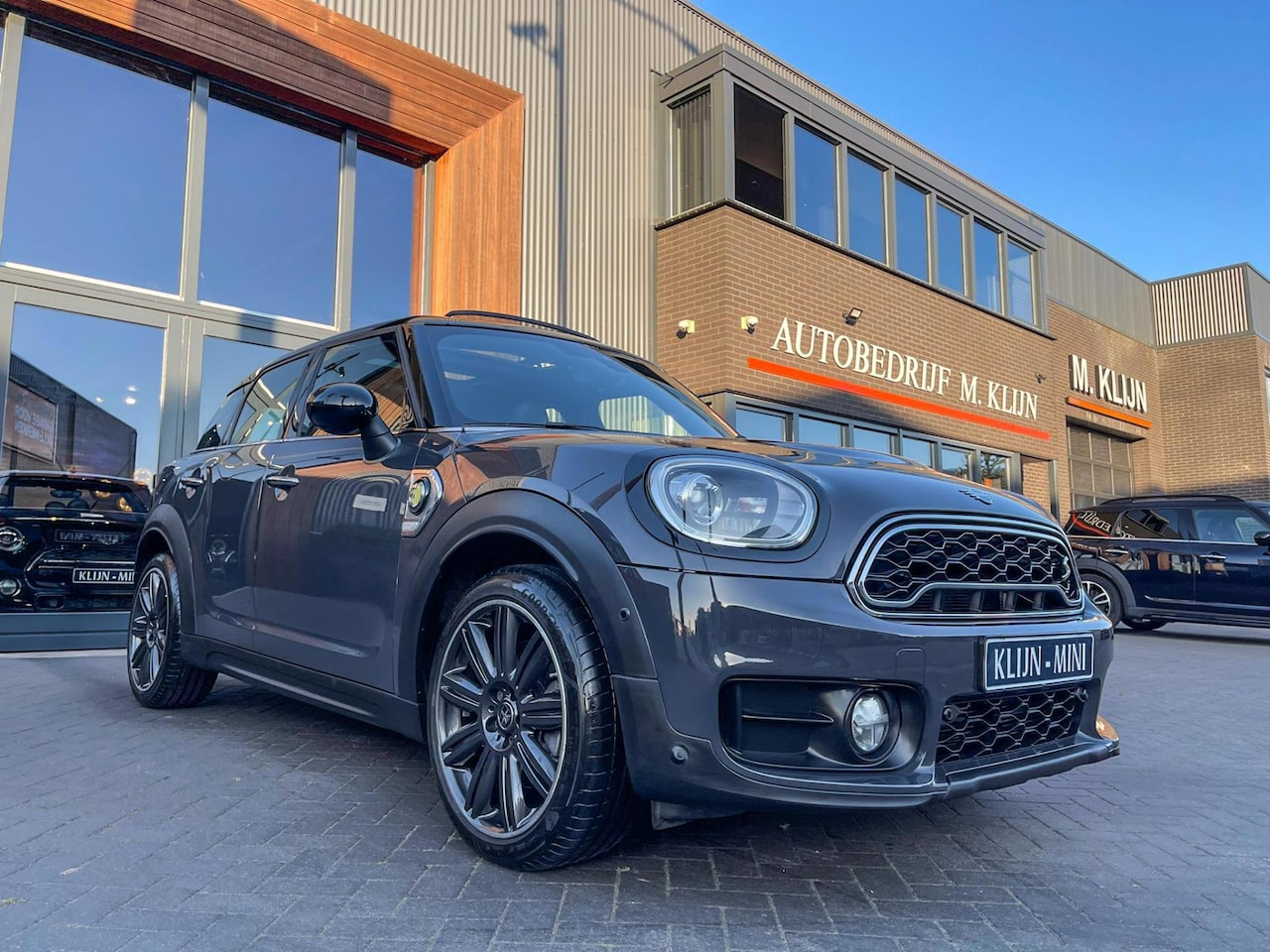 MINI Countryman - Mini 2.0 Cooper S E ALL4 Chili aut Hybrid/camera/leer/pano/led/vol - AutoWereld.nl