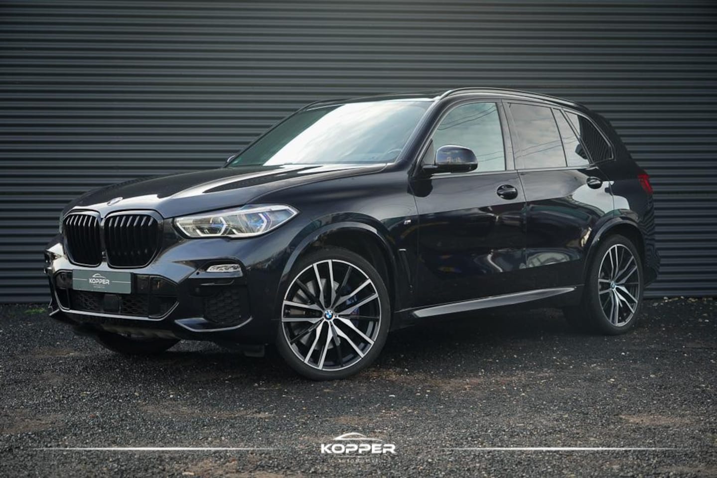 BMW X5 - xDrive30d High Executive / Luchtvering / HUD / 22 '' / M-Sport / Skylounge / Adaptive - AutoWereld.nl