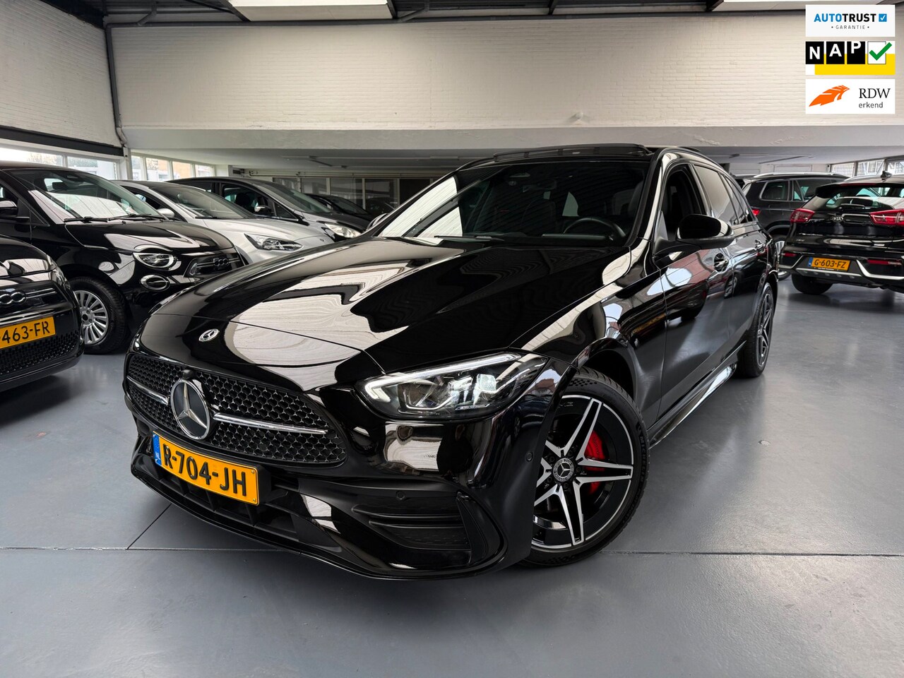 Mercedes-Benz C-klasse Estate - 300 e AMG Line |Panoramadak| - AutoWereld.nl