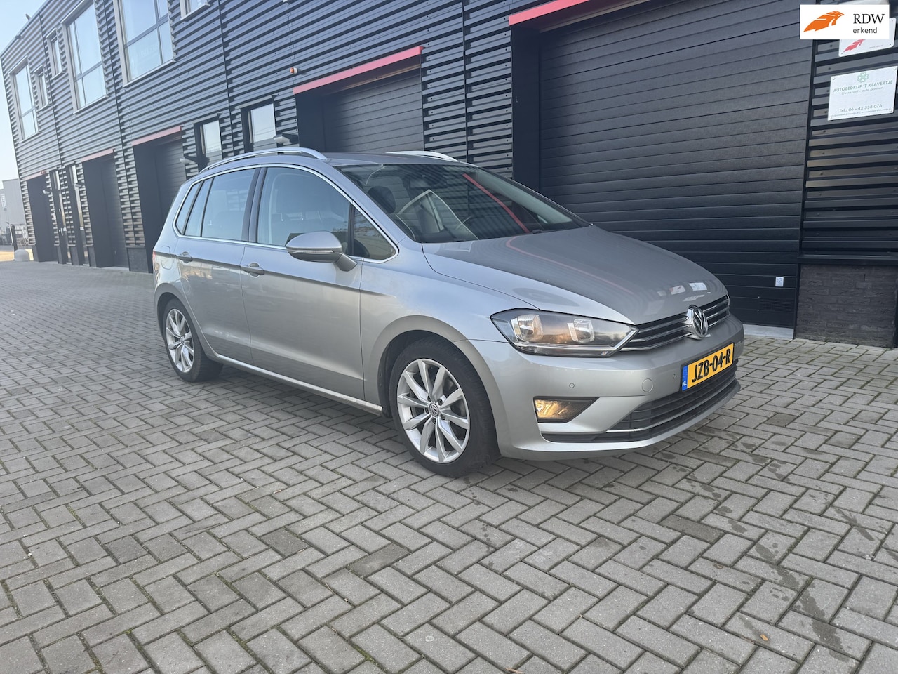 Volkswagen Golf Sportsvan - 2.0 TDI Highline | AUTOMAAT | PDC | NAVIGATIE | CAMERA | ELEC. PAKKET - AutoWereld.nl