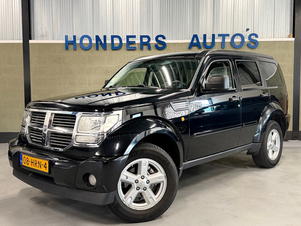 Dodge Nitro - 3.7 V6 SE SLT AROSA I TREKHAAK I ALL SEASON I 4X4 I NAVI I CRUISE I - AutoWereld.nl