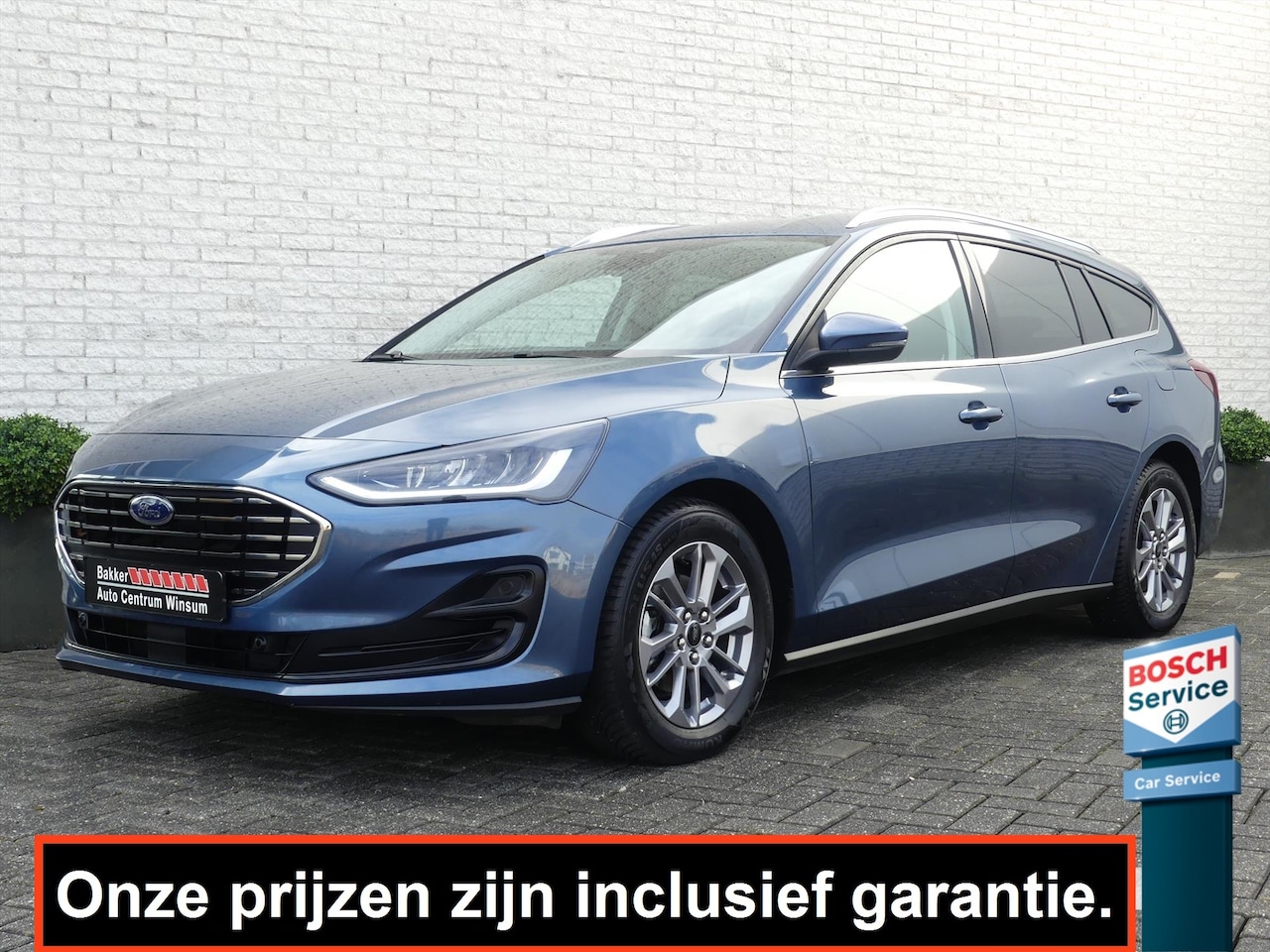 Ford Focus Wagon - 1.0 ECOB. TITANIUM 125PK NAVI/CAMERA/CLIMATE/CRUISE/STOEL+STUURVERW. - AutoWereld.nl
