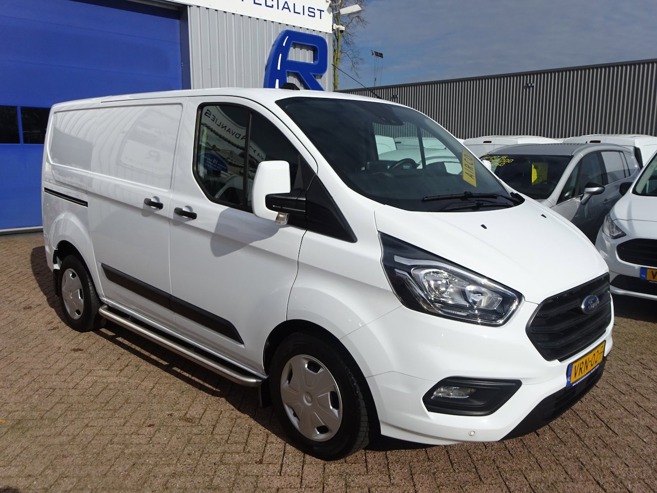 Ford Transit Custom - 340 2.0 TDCI L1H1 Trend 130 PK AIRCO NAVI CRUISE PDC NW.ST - AutoWereld.nl