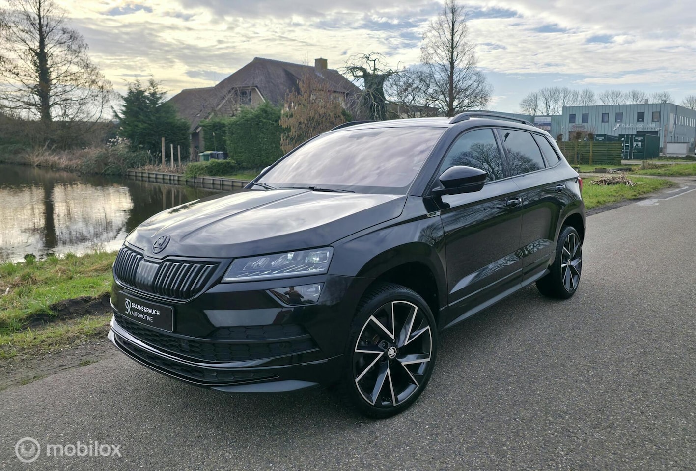 Skoda Karoq - 1.5 TSI ACT Sportline Business / Navi / Camera - AutoWereld.nl