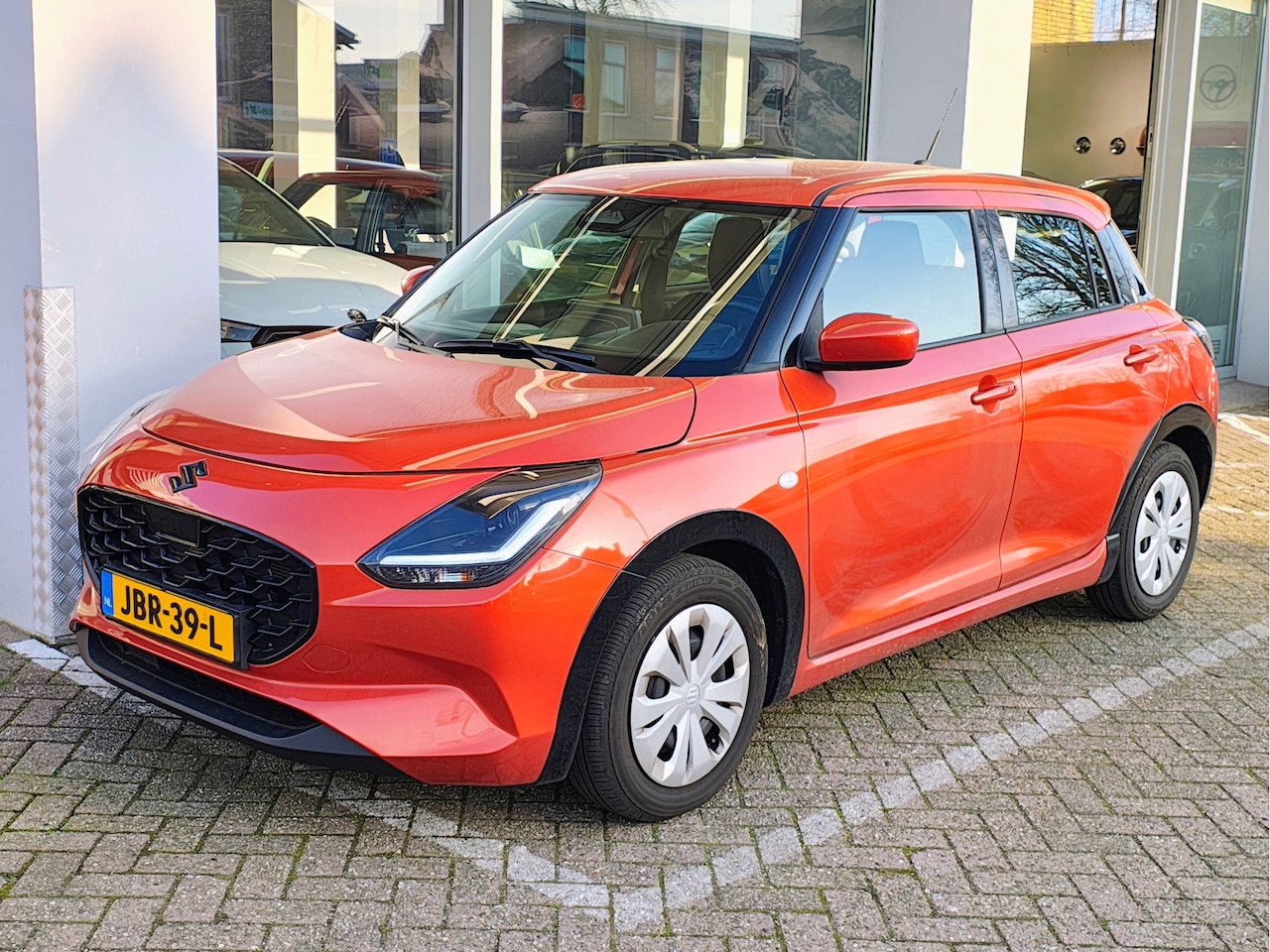 Suzuki Swift - 1.2 COMFORT SMART HYBRID | DEMO DEAL! | Garantie tot 2036! - AutoWereld.nl