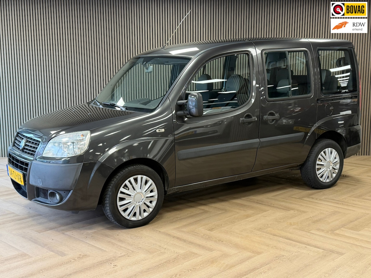 Fiat Doblò - 1.4 Family Plus 7 Pers. AIRCO ELEKTR. RAMEN SCHUIFDEUREN - AutoWereld.nl