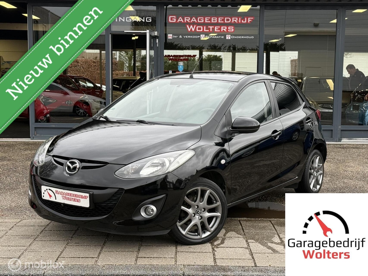 Mazda 2 - 1.3 TS PARK.SENSOREN AIRCO NAVI STOELVERWARM.NW APK - AutoWereld.nl