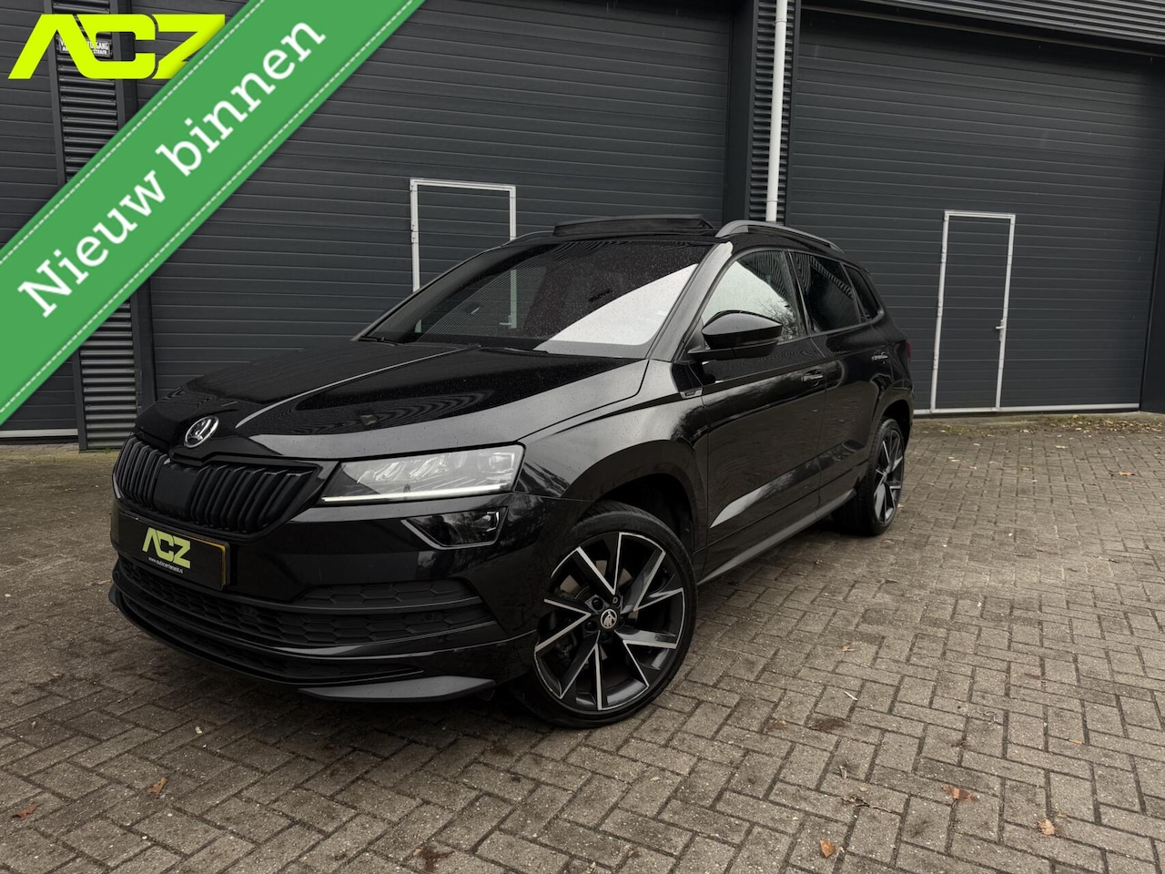 Skoda Karoq - 1.5 TSI DSG Sportline|Pano|Sfeer|Virtual|Cruise - AutoWereld.nl