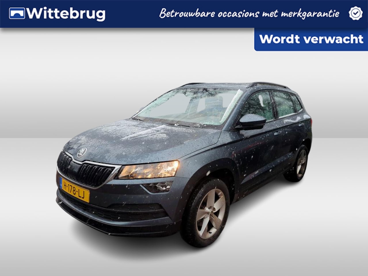 Skoda Karoq - 1.0 TSI Ambition Business / AUTOMAAT/ NAVI/ CLIMA/ CRUISE/ PARK. SENSOREN/ 17"LMV - AutoWereld.nl