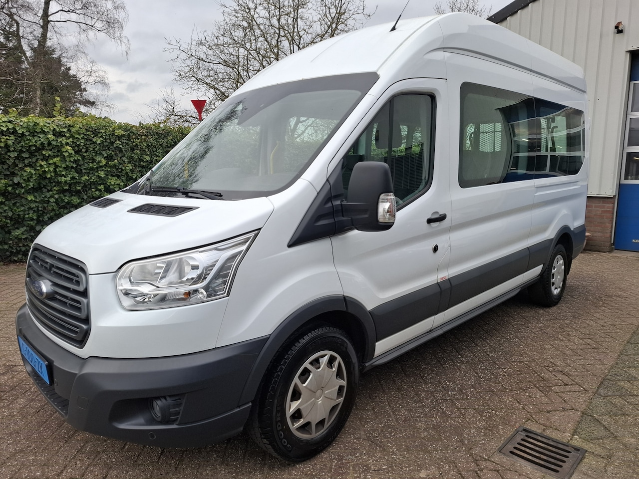 Ford Transit Kombi - 350 2.0 TDCI L2H3 33275.- INCL BTW ROLSTOELVERVOER 9-PERSOONS 130PK - AutoWereld.nl