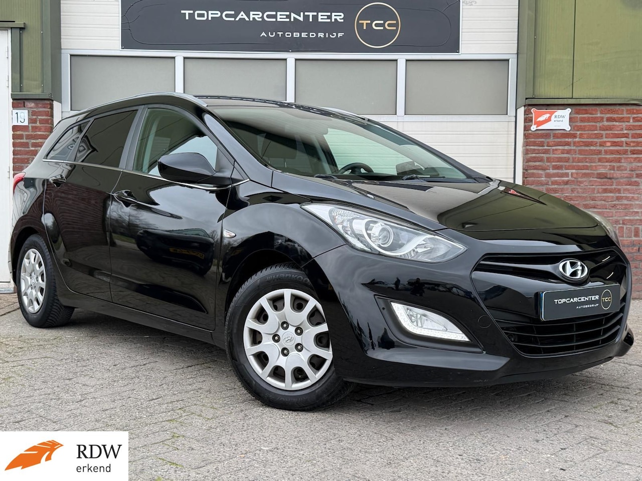 Hyundai i30 Wagon - 1.4/AIRCO/PARKS/CRUISE/APK - AutoWereld.nl