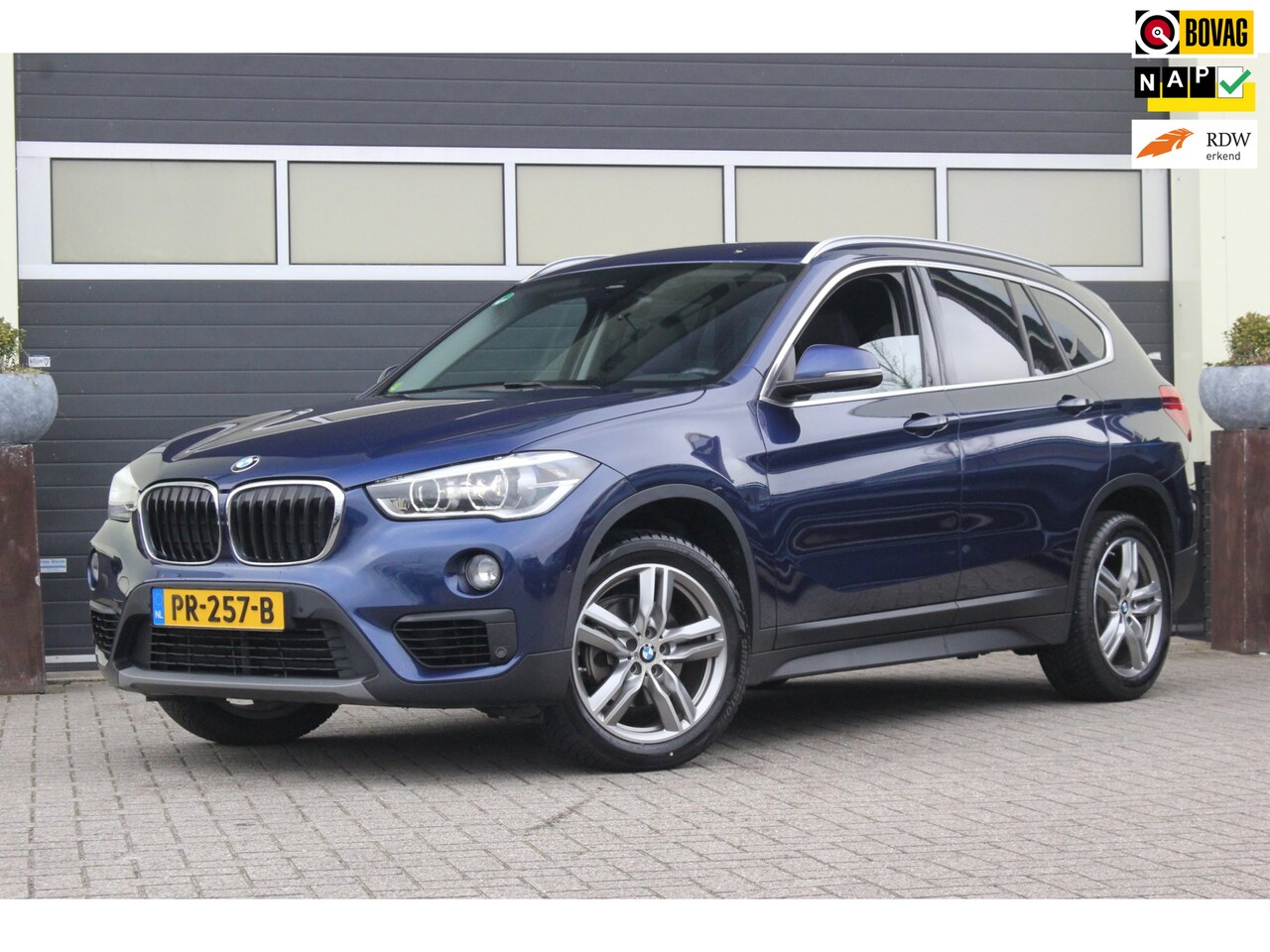 BMW X1 - SDrive18i High Executive | Leer | Head-up | - AutoWereld.nl