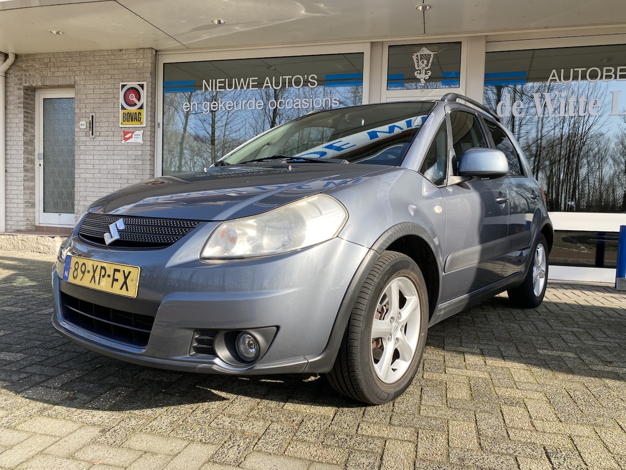 Suzuki SX4 - 1.6 Shogun Aneemb. trekhaak/Airco/Hoogte verst.b. stoel/Centr. vegr./Mistlampen voor/Radio - AutoWereld.nl