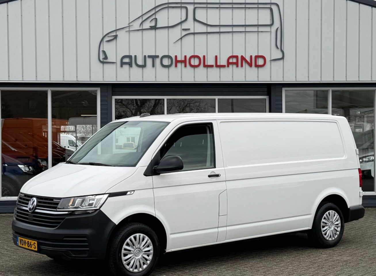 Volkswagen Transporter - 2.0 TDI 81KW 110PK L2H1 EURO 6 AIRCO/ CRUISE CONTROL/ BIJRIJDERSBANK/ PDC/ 100% DEALERONDE - AutoWereld.nl