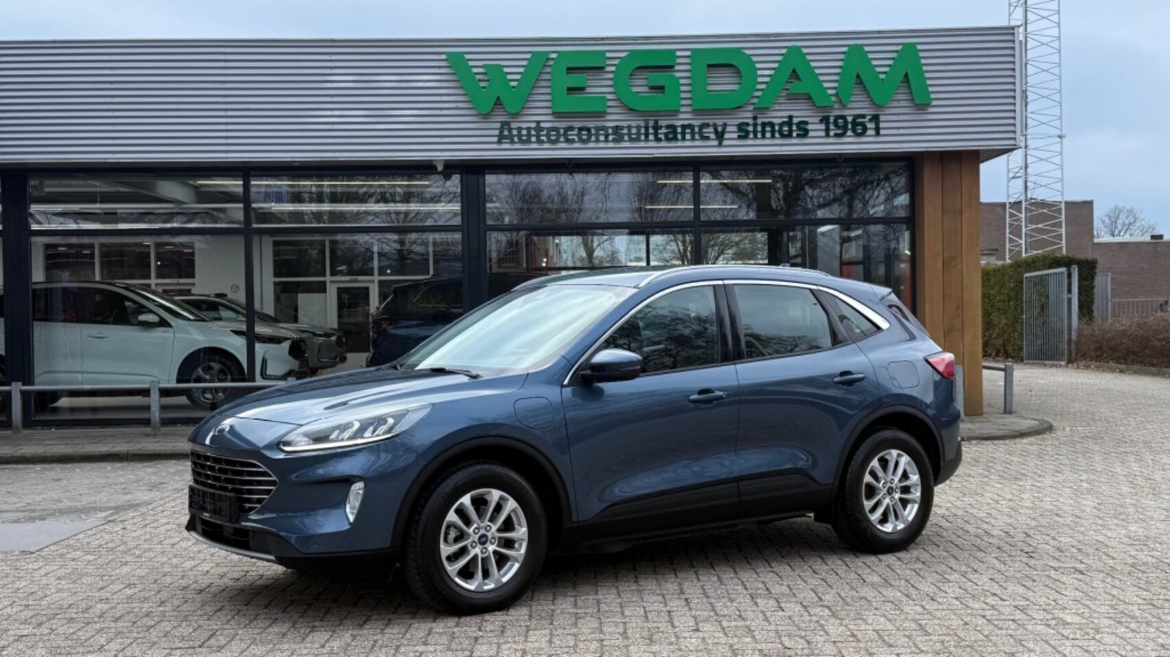 Ford Kuga - 2.5 PHEV TITANIUM / Trekhaak + Winter pack - AutoWereld.nl
