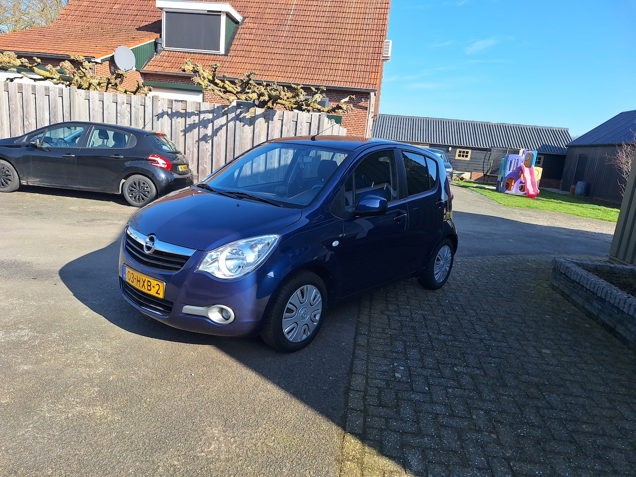 Opel Agila - 1.2 Enjoy met trekhaak en airco - AutoWereld.nl
