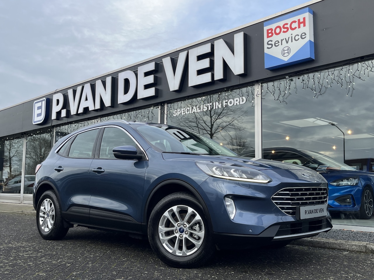 Ford Kuga - 2.5 PHEV Titanium 225pk/165kW e-CVT Automaat | Koplampsproeiers | Winter Pack | - AutoWereld.nl