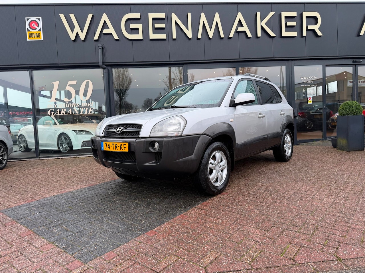 Hyundai Tucson - 2.0i Style Clima|Cruise|CARPLAY|Trekhaak - AutoWereld.nl