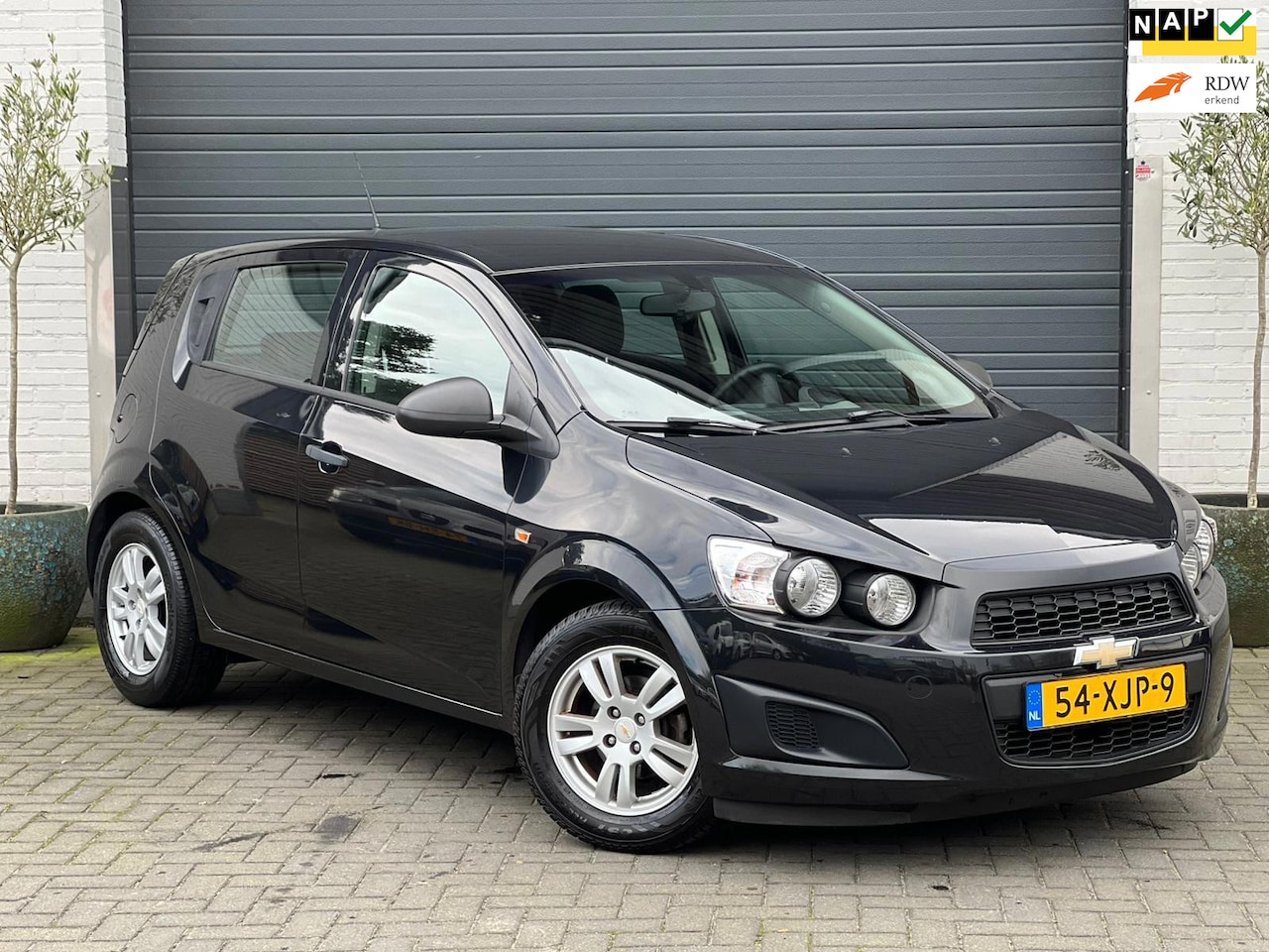 Chevrolet Aveo - 1.2 LS | 68513KM! | Airco | Cruise | Leder | Nw. APK | ISOFIX | Nette Auto | - AutoWereld.nl