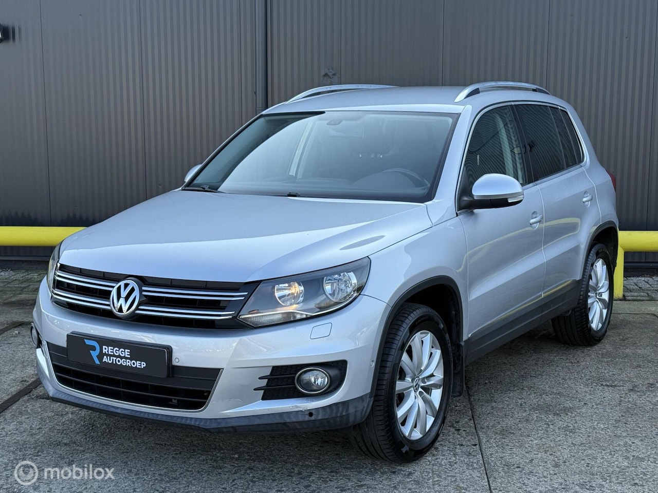 Volkswagen Tiguan - 1.4 TSI Sport&Style 4Motion - AutoWereld.nl