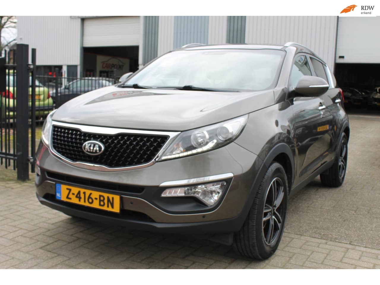 Kia Sportage - 1.6 GDI DynamicLine Leer Led Navi Trekhaak! - AutoWereld.nl