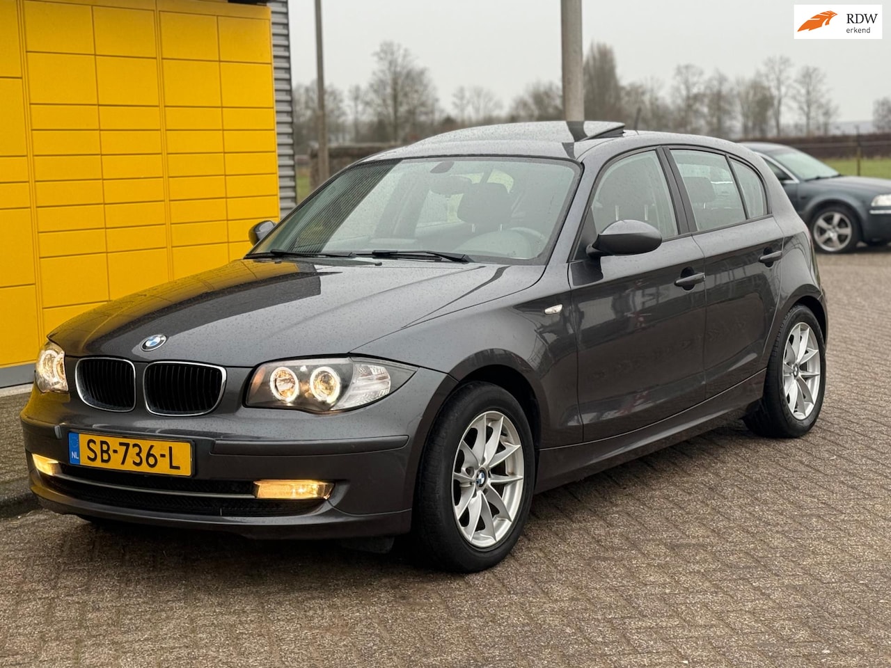BMW 1-serie - 116i Introduction Bj 2008 Schuifdak ECC Airco Navigatie - AutoWereld.nl