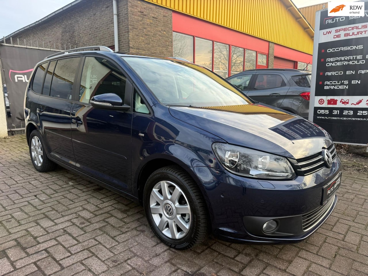 Volkswagen Touran - 1.4 TSI Comfortline EcoFuel 7p. Airco|LMV|Park Pilot|Cruise C.|Apk|Airco - AutoWereld.nl