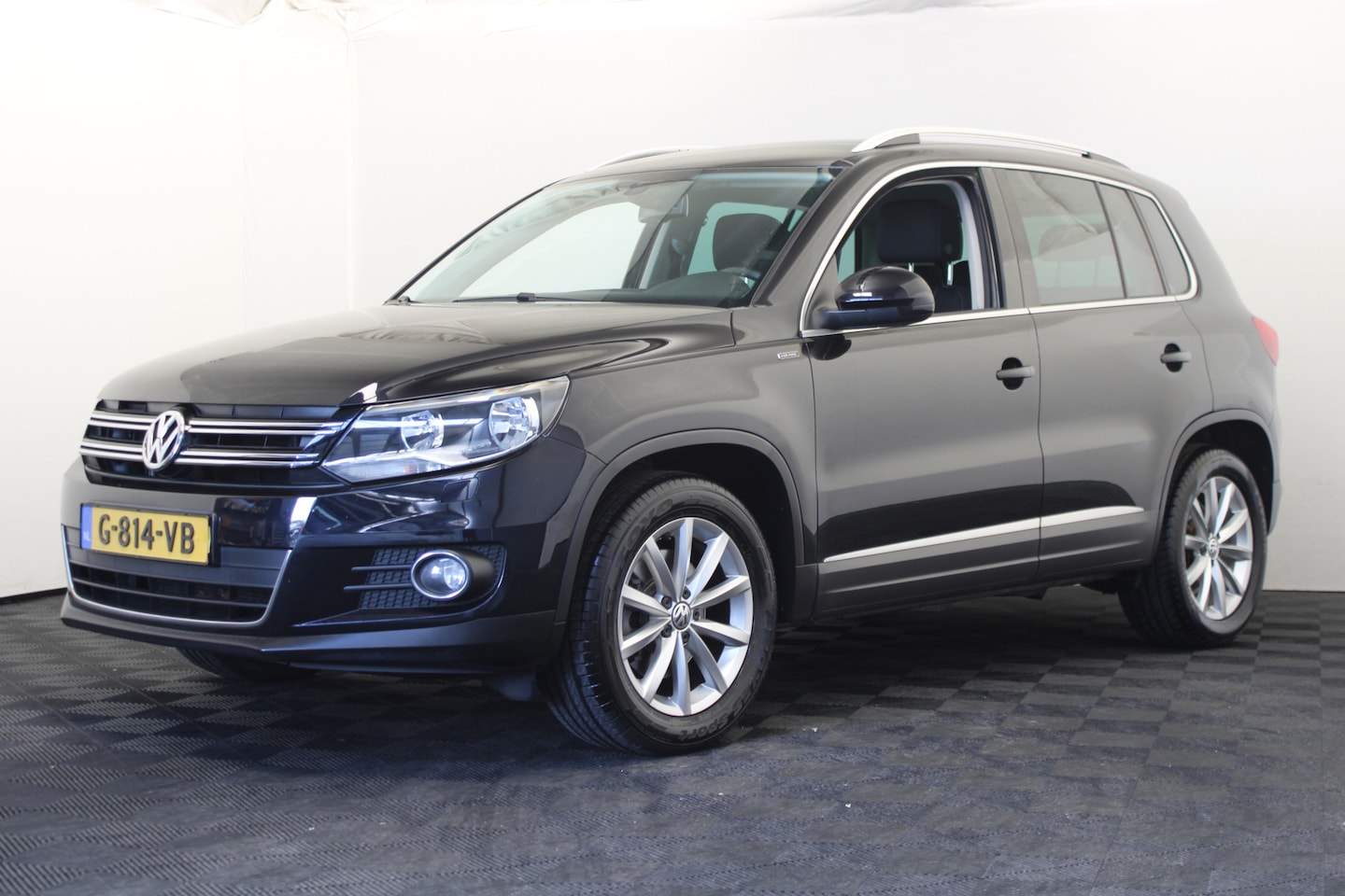 Volkswagen Tiguan - 1.4 TSI Sport&Style |Navi| - AutoWereld.nl