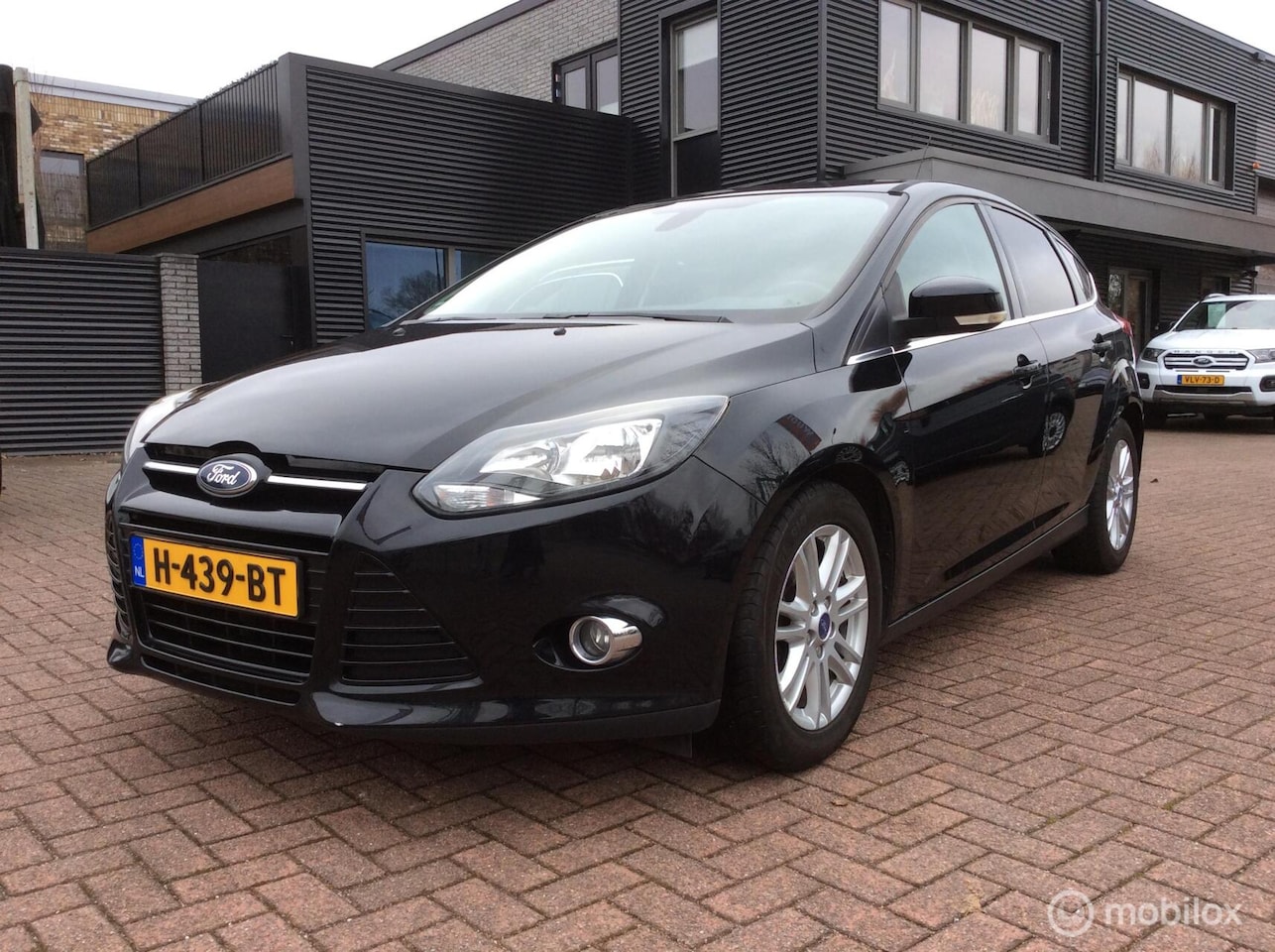 Ford Focus - 1.0 EcoBoost Titanium Lm Vlg 5-deurs Climate st verw - AutoWereld.nl