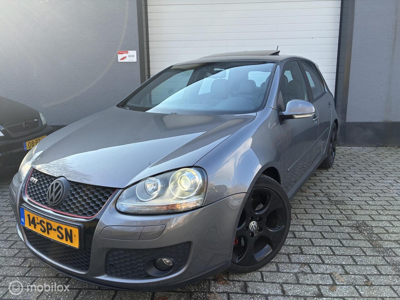 Volkswagen Golf - 2.0 TFSI GTI/AUTOMAAT/NIEUWE KETTING/+-270PK - AutoWereld.nl
