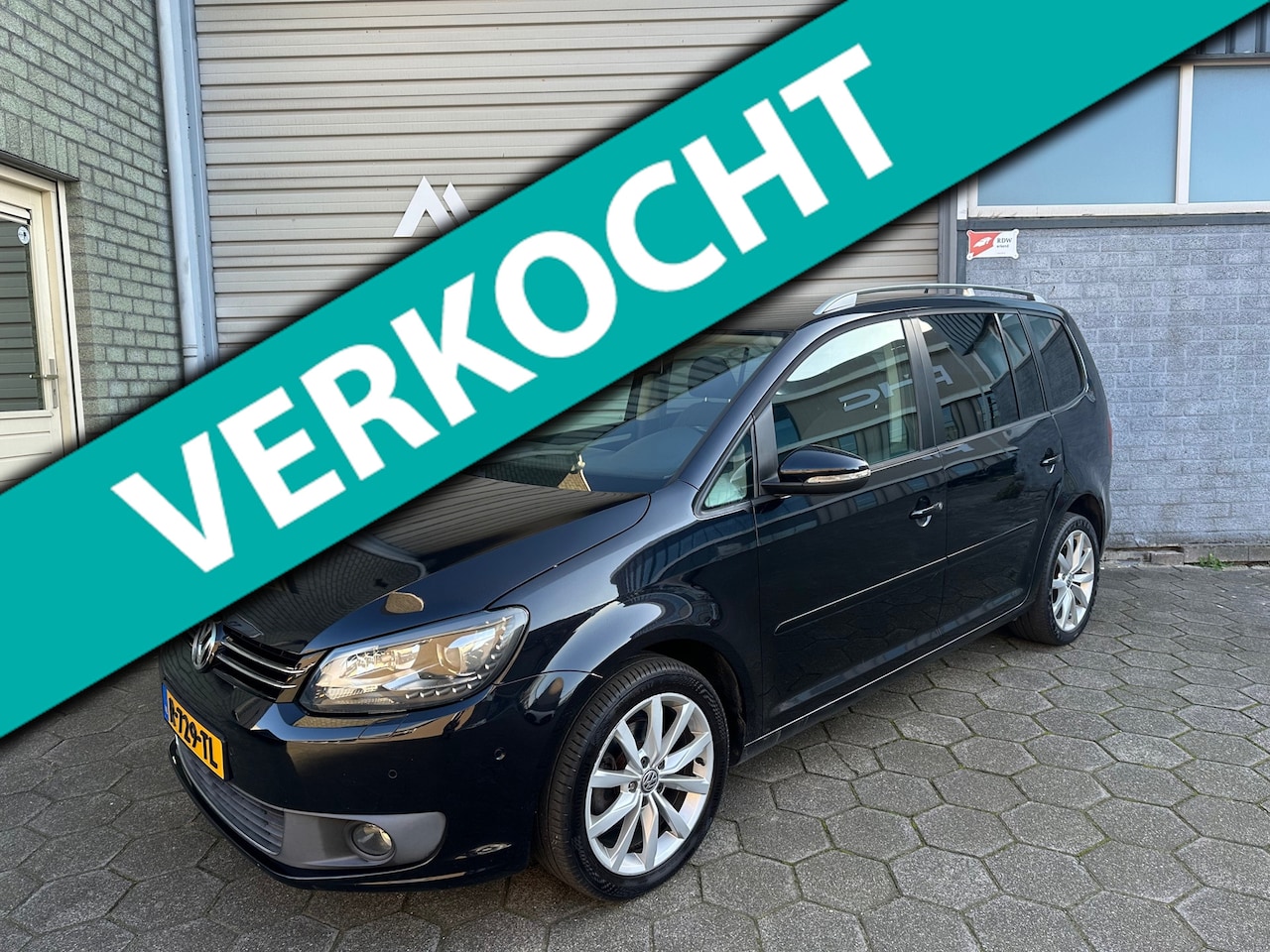 Volkswagen Touran - 1.4 TSI Highline 7p. AC / Cruise controle / PDC / LED / NAP / APK 04-2026 - AutoWereld.nl