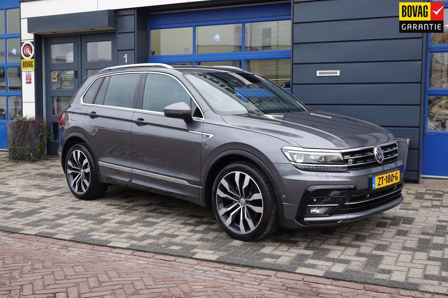 Volkswagen Tiguan - 2.0 TDI 4Motion Highline Business R PERFECT ONDERHOUDEN! - AutoWereld.nl