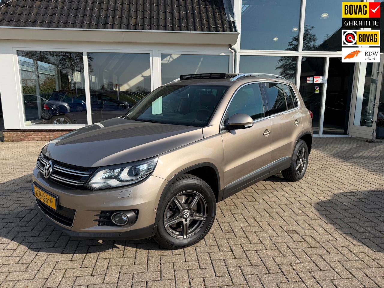 Volkswagen Tiguan - 2.0 TSI Sport&Style - 4Motion - Face-life model - AutoWereld.nl