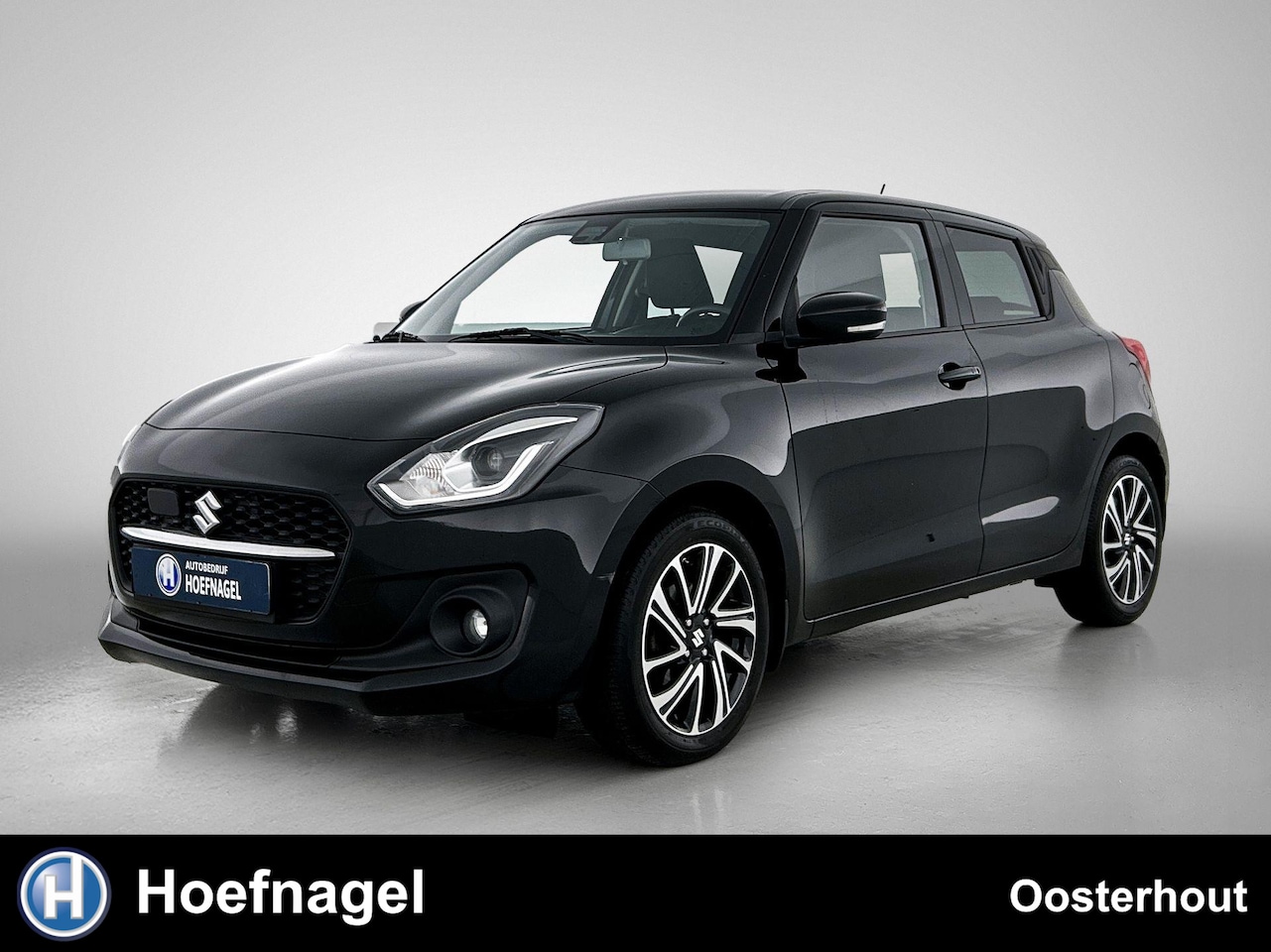 Suzuki Swift - 1.2 Style Smart Hybrid | Adaptive cruise | Stoelverwarming | Navigatie | Camera - AutoWereld.nl